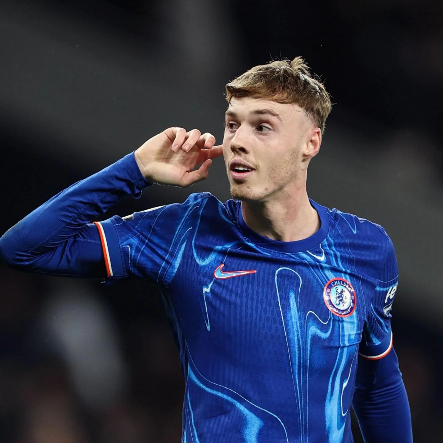 The Chelsea FC striker was at MICFootball 2016 wearing a Manchester City shirt.